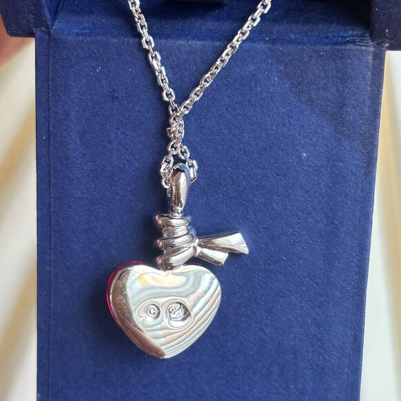 Swarovski Ties of Love pendant necklace with a red heart-shaped crystal. - Picture 5 of 11